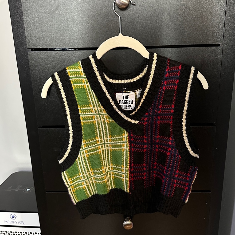 Ragged priest sweater vest